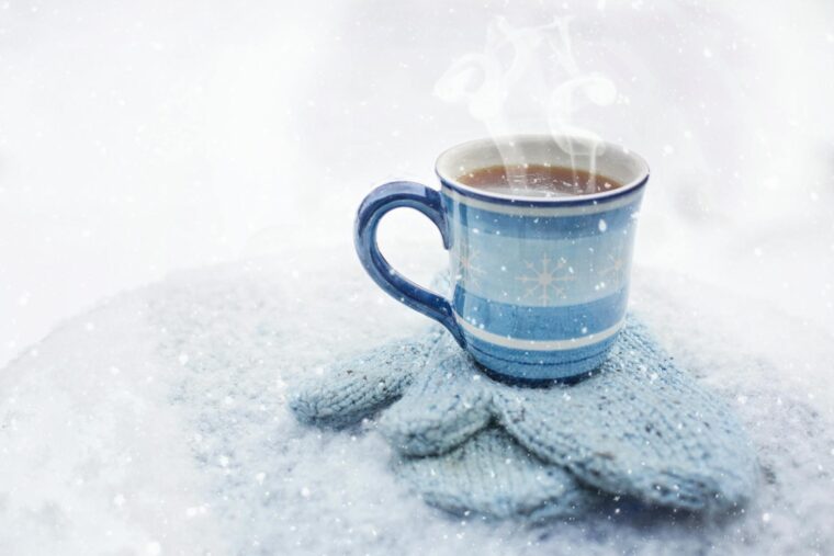 blue ceramic cup filled with liquid